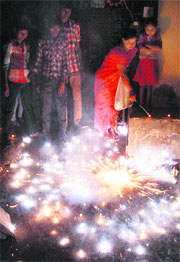 A fire cracker weaves a captivating pattern on Diwali in Gurgaon on Sunday