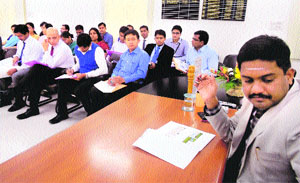 Officer trainees from the the Lal Bahadur Shastri National Academy of Administration, Mussoorie, with Deputy Commissioner J Ganesan in Sirsa on Monday.
