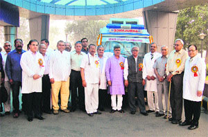 Rajya Sabha MP Shadi Lal Batra (fifth from right) and MLA BB Batra (sixth from right) at the launch of a free ambulance service for senior citizens in Rohtak on Sunday. 