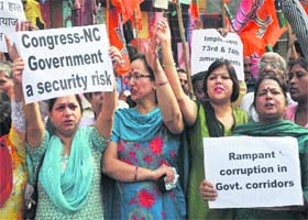 BJP activists participate in an anti-government protest in Jammu on Monday