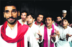 Artistes enact a scene from the play Deemak, directed by Neeraj Kant, staged as part of Natrang Sunday Theatre Series in Jammu on Sunday.