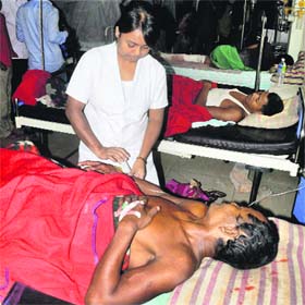 An injured villager being treated at a hospital in Guwahati on Monday