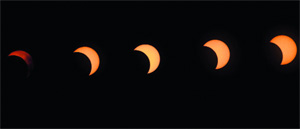 This combination of pictures shows the transition of a hybrid solar eclipse near Naivasha in Kenya on Sunday.