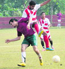 Players in action during a match at the Football Ground, Sector 17, in Chandigarh on Tuesday. 
