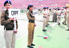 Personnel of the Chandigarh police rehearse for the police tennis games at the CLTA, Sector 10, on Tuesday.