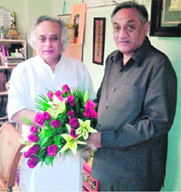 Chief Minister Vijay Bahuguna meets Union Rural Development Minister Jairam Ramesh in New Delhi on Tuesday.