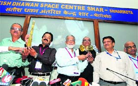 ISRO chairman Radhakrishnan (C) and other scientists during the press conference at the Satish Dhawan Space Centre at Sriharikota on Tuesday