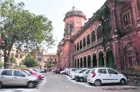 Vehicles parked at Mubarak Mandi historic complex