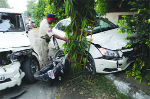 Damaged vehicles at an accident site in Ludhiana.