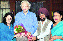 Dr Martin Claton from the department of music, Durham University, England, being welcomed by GNDU officials during a function in Amritsar on Wednesday