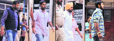 Accused in the advocate Amarpreet Singh murder case come out of the District Courts in Phase 3B1 in Mohali on Wednesday.