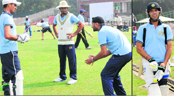 Guru Mantra: Players of the Punjab Ranji team get tips from Harbhajan Singh during a practice match held at the Cricket Stadium in Sector 16, Chandigarh, on Wednesday; and (right) Yuvraj Singh.