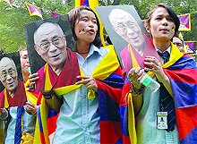Tibetans living in exile shout slogans during a Tibet Solidarity Campaign at Jantar Mantar in New Delhi on Wednesday