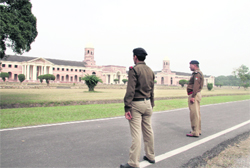 Policemen deployed at the Forest Research Institute in Dehradun on Wednesday. Tribune photo: Vinod Pundir