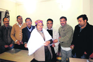 Surendar Singh Pundir being felicitated at a function in Mussoorie on Wednesday. 