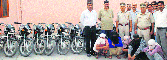 A CIA team with recovered motorcycles and five accused in Kaithal on Wednesday. Photo: Satish Seth