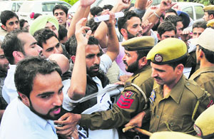 Unemployed veterinary doctors stage a protest in support of their demands in Jammu on Wednesday. 