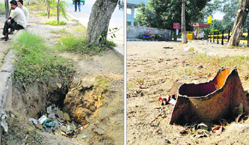 A pit poses a threat to commuters at Ferozepur Road; and (right) the remains of an uprooted unipole can prove fatal in Ludhiana. With pleas going unheard, the civic officials have chosen to look the other way.