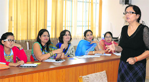 An expert speaks about learning disablities at a workshop in Ludhiana. 