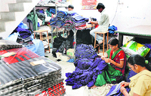 Workers at a hosiery unit in Ludhiana. 