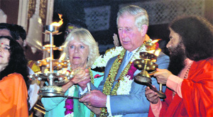 Prince Charles and Duchess of Cornwall Camila Parker perform the arti in Rishikesh on Wednesday. 