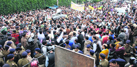 Government teachers hold a protest in front of the Secretariat in support of their demands in Dehradun on Thursday.