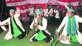 The Nand Lal Bharti group performs a folk dance at Kempty near Mussoorie on Thursday.