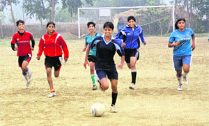 Girls play football in Alakhpura village in Bhiwani.