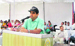 DC Nikhil Gajraaj addresses a gathering at the state-level women sports championships at Dronacharya Stadium, Kurukshetra, on Wednesday