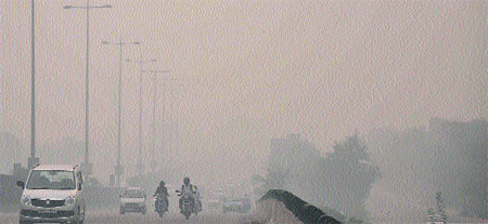 Dipping of temperature causes less visibility for commuters on National Highway no. 8, Gurgaon.