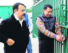 HPCA spokesperson Sanjay Sharma (left) takes over Hotel Pavilion in Dharamsala on Thursday. 