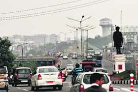 Day turns into night: Cloudy weather reduced visibility on roads, forcing the civic authorities to turn on the streetlights in Jammu on Thursday
