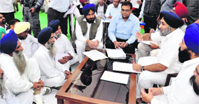 Deputy CM Sukhbir Badal listens to grievances of residents at Ghattianwali Jattan village in Fazilka.