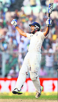 Rohit Sharma celebrates after reaching his hundred in his debut game at Eden Gardens on Thursday