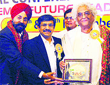 CBSE chairman Vineet Joshi (centre) being felicitated at the National Sahodya Conference in Amritsar on Friday