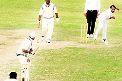 A player in action during the All-India Inter-Zonal Cricket Tournament at Gandhi Ground in Amritsar on Friday