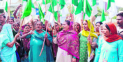 Women members of the Kissan Sangarsh Samiti hold a protest against the BHEL management in Haridwar on Friday
