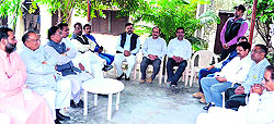 Legislators Swami Yatishwaranand and Sanjay Gupta hold a meeting with party leaders in Haridwar on Friday ahead of the 2014 Lok Sabha elections