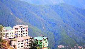 Construction work on a hill near Shimla on Thursday.