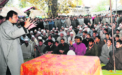 Peoples Conference chairman Sajad Gani Lone addresses party workers at Soibug in Budgam district on Friday. Tribune Photo: Amin War