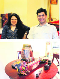 (Above) Anubhuti Rana(left) and Ajay Jain Mongolian guitar from one of their trips among others