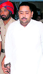Former SAD councillor Vicky Kanda being taken to the court in Amritsar on Wednesday