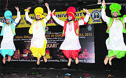 Students perform bhangra during the 20th Annual Sahodya Conference of CBSE principals at GNDU in Amritsar on Saturday