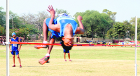 An athlete scales the bar during high jump at the IPSC Athletics Meet at PPS, Nabha.