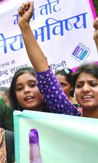 Youngs girls participating in a voter awareness rally, organised by the Central District Election Office in New Delhi on Saturday.