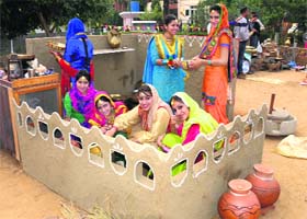 Students create a rural backdrop
