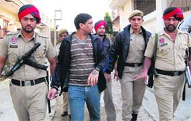 The accused Gobinder Singh in police custody in Jalandhar on Saturday