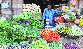A vendor waits for customers in Jammu on Saturday.