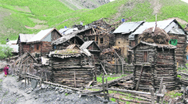 A cluster of wooden hoses in north Kashmirs Gurez area on Saturday, which remains cut off from the Valley due to snow.