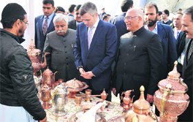 Chief Minister Omar Abdullah and Minister for Planning Ajay Sadhotra visit a stall at the Jammu and Kashmir Entrepreneurship Development Institute in Pampore on Saturday.